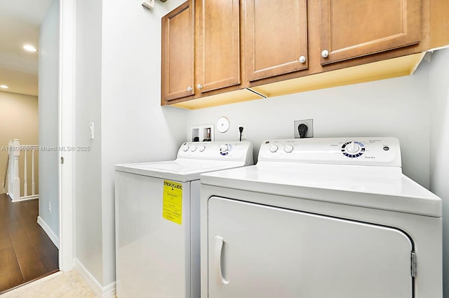 4631 Mediterranean Cir, Palm Beach Gardens, FL 33418 - laundry room featuring washing machine and clothes dryer, cabinet space, recessed lighting, and baseboards
