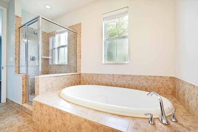 4631 Mediterranean Cir, Palm Beach Gardens, FL 33418 - bathroom with a stall shower, a bath, and tile patterned floors