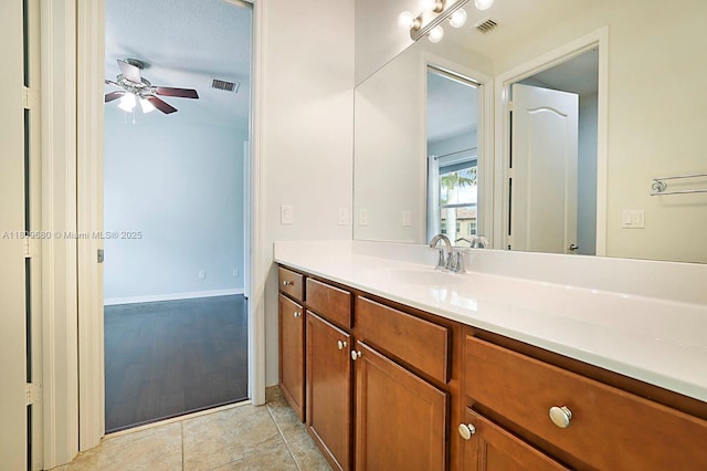 4631 Mediterranean Cir, Palm Beach Gardens, FL 33418 - bathroom with a ceiling fan and vanity