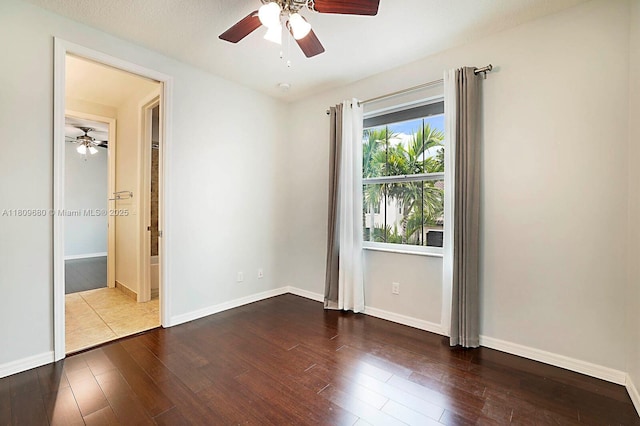 4631 Mediterranean Cir, Palm Beach Gardens, FL 33418 - spare room with a ceiling fan and wood-type flooring