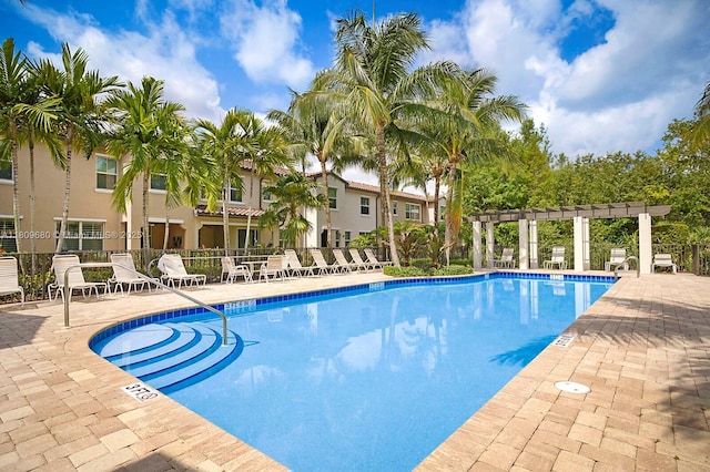 4631 Mediterranean Cir, Palm Beach Gardens, FL 33418 - community pool with a patio and a pergola