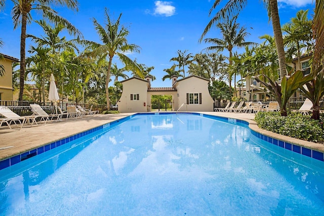4631 Mediterranean Cir, Palm Beach Gardens, FL 33418 - community pool featuring a patio
