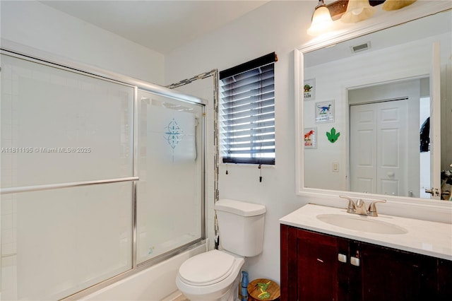 1482 Canary Island Dr, Weston, FL 33327 - bathroom with vanity, toilet, and shower / bath combination with glass door