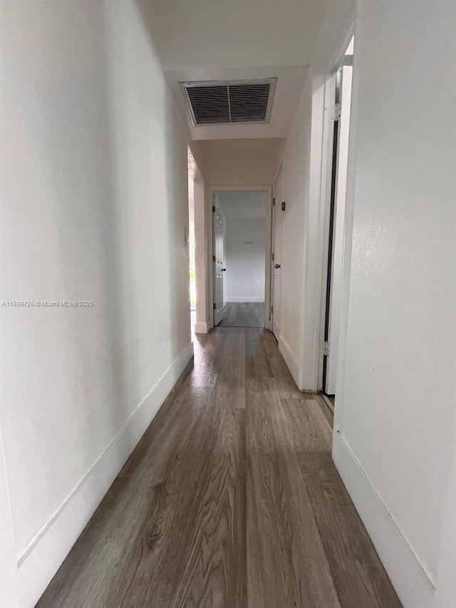 4888 NW 8th Ct, Plantation, FL 33317 - hall featuring dark wood-type flooring and baseboards
