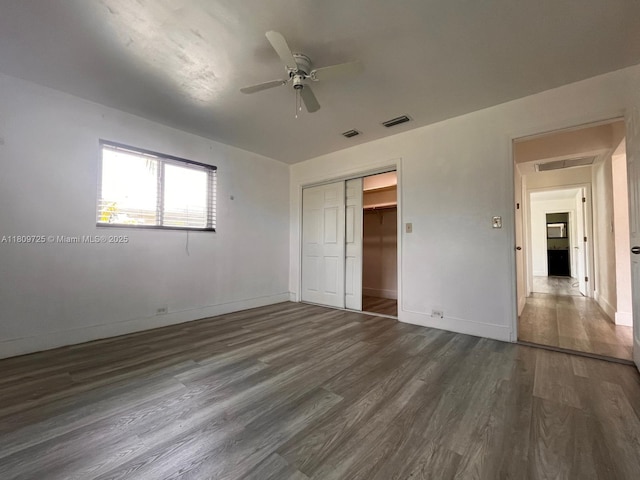 4888 NW 8th Ct, Plantation, FL 33317 - unfurnished bedroom with dark wood-style floors, baseboards, a closet, and ceiling fan