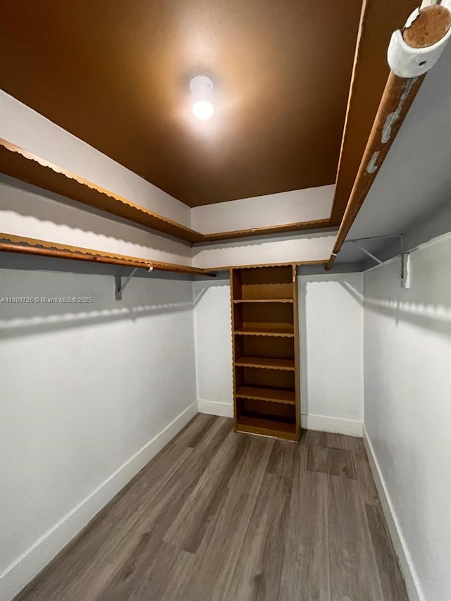 4888 NW 8th Ct, Plantation, FL 33317 - spacious closet featuring wood finished floors