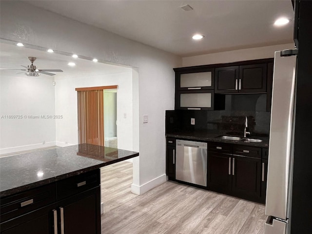 4888 NW 8th Ct, Plantation, FL 33317 - kitchen featuring appliances with stainless steel finishes, a sink, light wood finished floors, ceiling fan, and recessed lighting