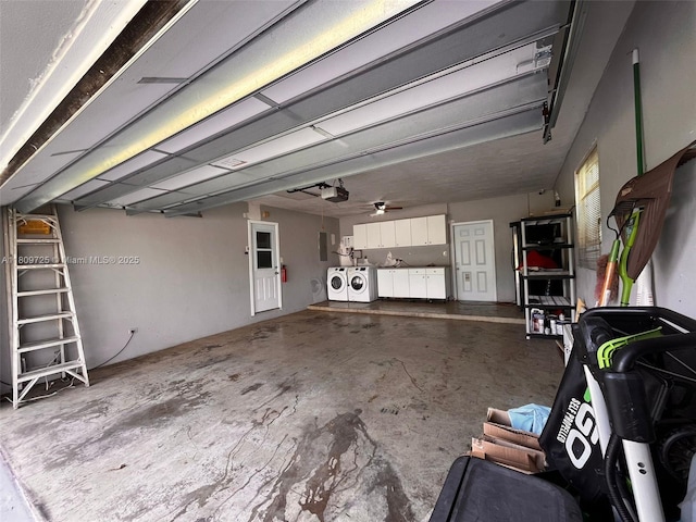 4888 NW 8th Ct, Plantation, FL 33317 - garage with independent washer and dryer, a garage door opener, and electric panel