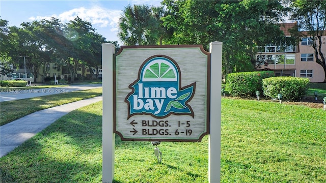 9091 Lime Bay Blvd Unit 110, Tamarac, FL 33321 - community sign with a lawn