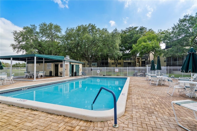 9091 Lime Bay Blvd Unit 110, Tamarac, FL 33321 - community pool with a patio area
