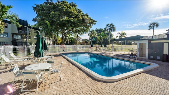 9091 Lime Bay Blvd Unit 110, Tamarac, FL 33321 - community pool with a patio