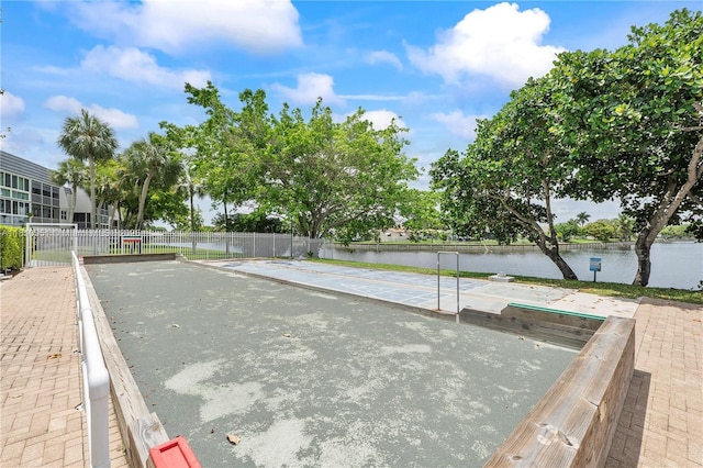 9091 Lime Bay Blvd Unit 110, Tamarac, FL 33321 - view of community featuring shuffleboard, a water view, and a bocce ball area