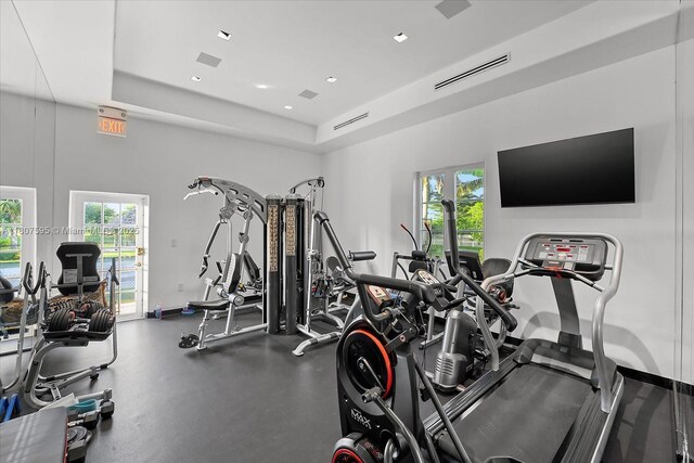 18451 SW 158th St, Miami, FL 33187 - exercise room featuring recessed lighting and a tray ceiling