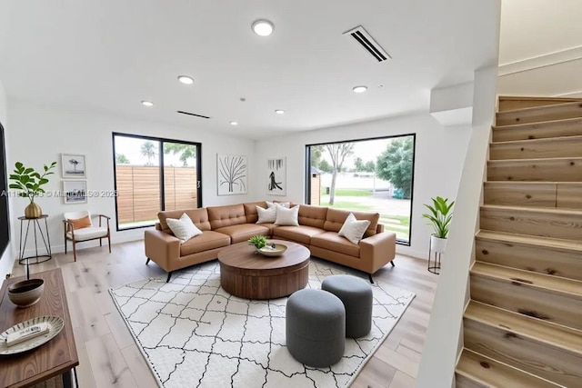 5700 SW 56th St, Davie, FL 33314 - living room with stairway, recessed lighting, plenty of natural light, and light wood-style floors