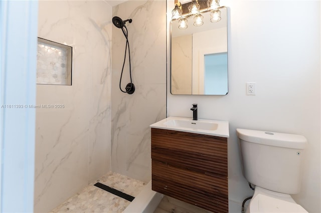 5700 SW 56th St, Davie, FL 33314 - bathroom featuring toilet, vanity, and a marble finish shower