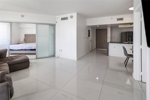 1750 N Bayshore Dr Unit 5214, Miami, FL 33132 - living area with light tile patterned floors and baseboards