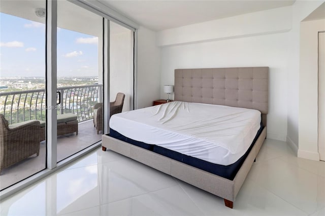 1750 N Bayshore Dr Unit 5214, Miami, FL 33132 - bedroom with access to outside, light tile patterned floors, baseboards, and floor to ceiling windows