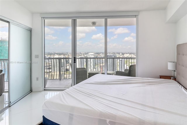 1750 N Bayshore Dr Unit 5214, Miami, FL 33132 - bedroom with access to outside and tile patterned flooring