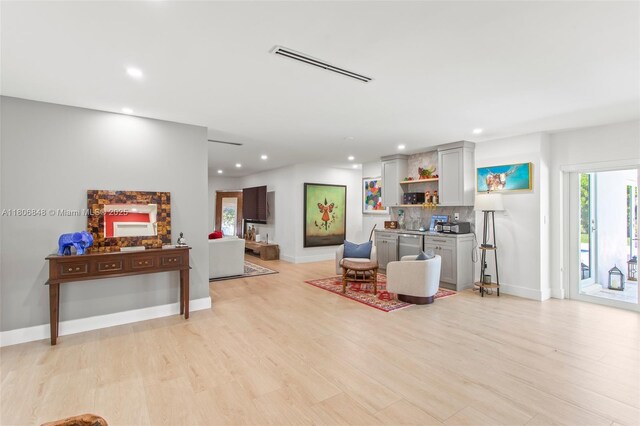 14270 SW 74th Ct, Palmetto Bay, FL 33158 - living room featuring recessed lighting, light wood-style floors, and baseboards