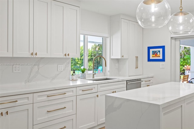 14270 SW 74th Ct, Palmetto Bay, FL 33158 - kitchen with a sink, dishwasher, white cabinetry, and healthy amount of natural light