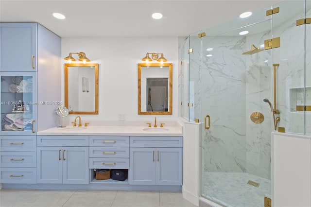 14270 SW 74th Ct, Palmetto Bay, FL 33158 - bathroom featuring a marble finish shower, double vanity, recessed lighting, and tile patterned floors