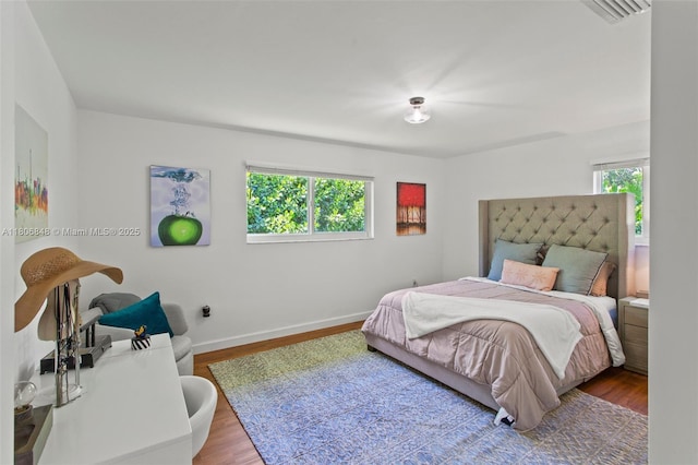 14270 SW 74th Ct, Palmetto Bay, FL 33158 - bedroom featuring wood finished floors and baseboards