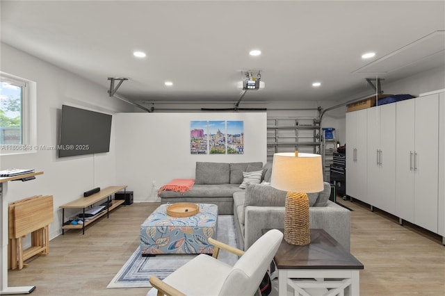 14270 SW 74th Ct, Palmetto Bay, FL 33158 - living area featuring a garage, recessed lighting, and light wood-style floors