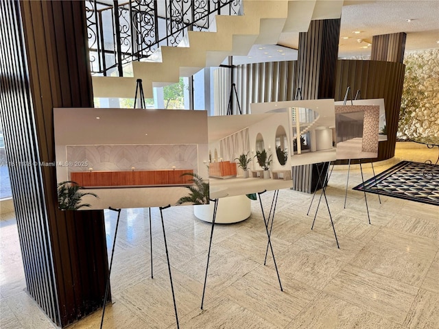 5555 Collins Ave Unit 6E, Miami Beach, FL 33140 - community lobby featuring a high ceiling