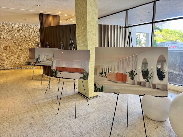 5555 Collins Ave Unit 6E, Miami Beach, FL 33140 - common area with a towering ceiling