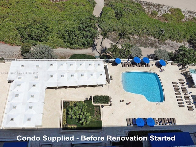 5555 Collins Ave Unit 6E, Miami Beach, FL 33140 - drone / aerial view of a pool area