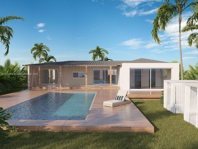 360 NW 87th St, El Portal, FL 33150 - rear view of property featuring a deck, an outdoor pool, a lawn, and metal roof