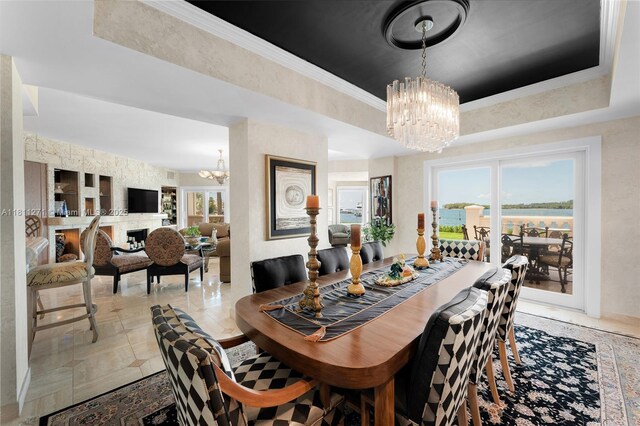2213 Fisher Island Dr Unit 3103, Miami Beach, FL 33109 - dining room with a chandelier and a raised ceiling