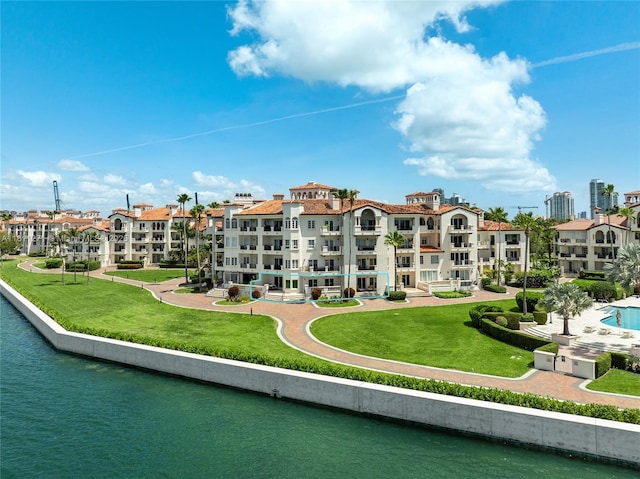 2213 Fisher Island Dr Unit 3103, Miami Beach, FL 33109 - view of property's community with a yard and a water view