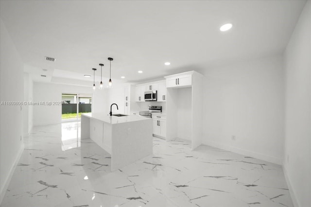 4800 Nelson Dr, Lehigh Acres, FL 33973 - kitchen featuring stainless steel appliances, a sink, baseboards, recessed lighting, and white cabinets