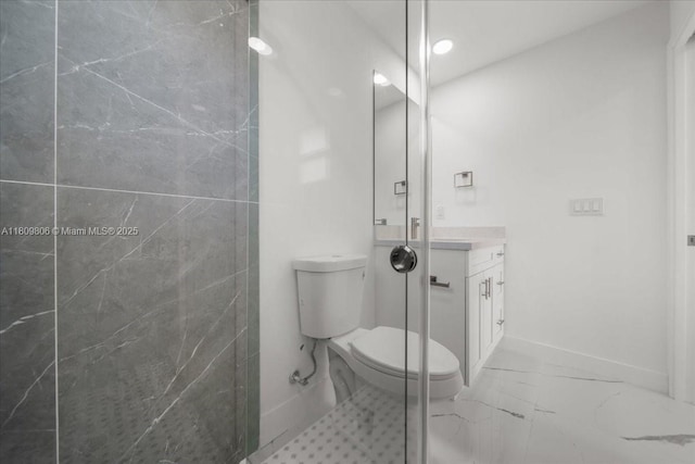 4800 Nelson Dr, Lehigh Acres, FL 33973 - bathroom with toilet, vanity, marble finish flooring, a shower stall, and baseboards