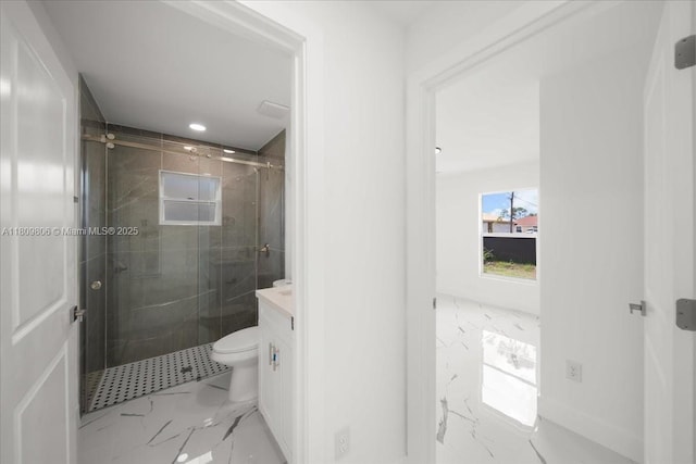 4800 Nelson Dr, Lehigh Acres, FL 33973 - full bathroom featuring marble finish flooring, a shower stall, vanity, and toilet
