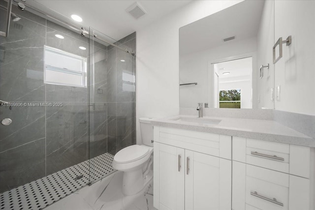 4800 Nelson Dr, Lehigh Acres, FL 33973 - full bathroom featuring vanity, toilet, a stall shower, marble finish flooring, and recessed lighting