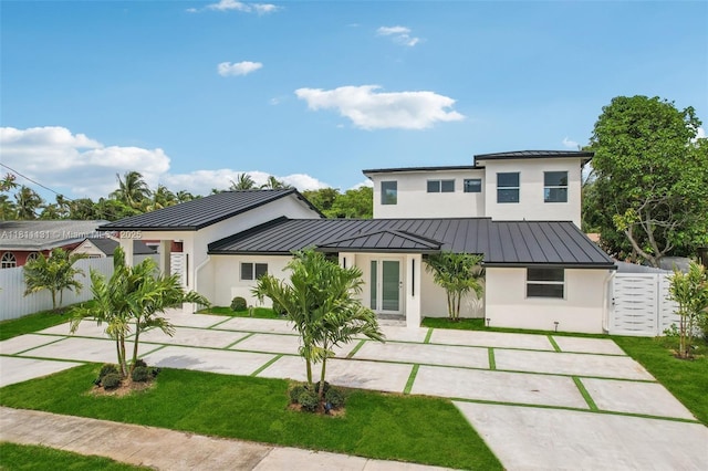 2001 SW 23rd Ave, Fort Lauderdale, FL 33312 - back of house featuring a standing seam roof, metal roof, and stucco siding