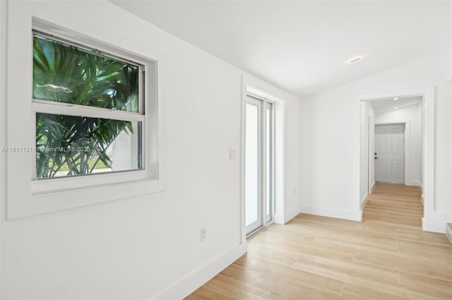2001 SW 23rd Ave, Fort Lauderdale, FL 33312 - unfurnished room with light wood-type flooring, baseboards, and vaulted ceiling