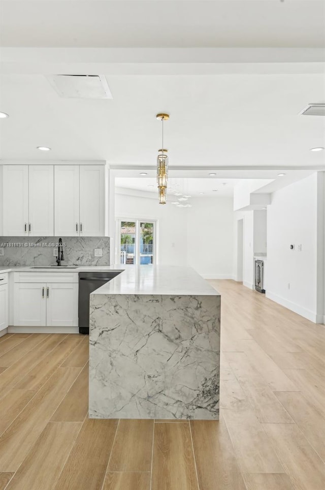 2001 SW 23rd Ave, Fort Lauderdale, FL 33312 - kitchen featuring a sink, dishwasher, white cabinets, tasteful backsplash, and open floor plan