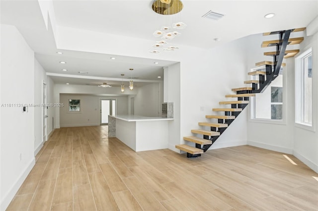 2001 SW 23rd Ave, Fort Lauderdale, FL 33312 - stairway with wood finished floors, baseboards, and recessed lighting