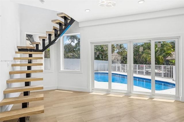 2001 SW 23rd Ave, Fort Lauderdale, FL 33312 - staircase with wood finished floors, recessed lighting, and baseboards