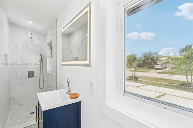 2001 SW 23rd Ave, Fort Lauderdale, FL 33312 - bathroom featuring vanity and a marble finish shower