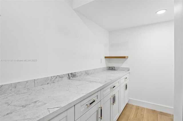2001 SW 23rd Ave, Fort Lauderdale, FL 33312 - bathroom featuring wood finished floors, recessed lighting, and baseboards