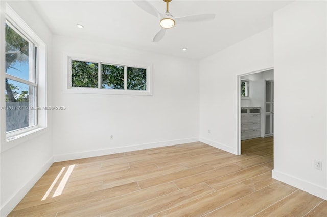 2001 SW 23rd Ave, Fort Lauderdale, FL 33312 - empty room featuring a ceiling fan, light wood-type flooring, and baseboards