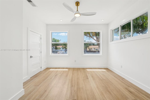 2001 SW 23rd Ave, Fort Lauderdale, FL 33312 - empty room featuring healthy amount of natural light, light wood finished floors, a ceiling fan, baseboards, and recessed lighting