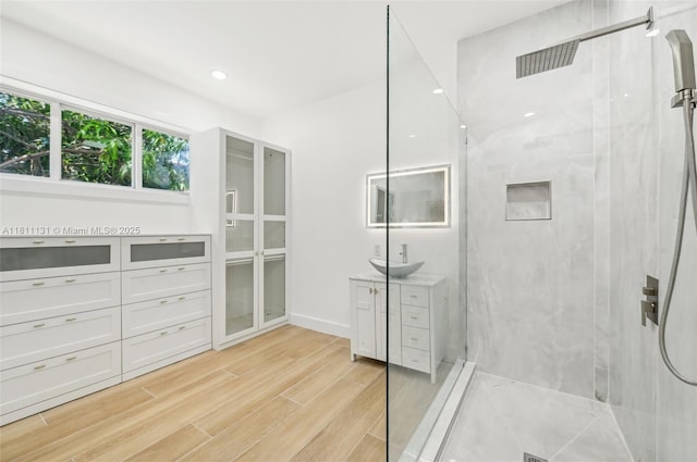 2001 SW 23rd Ave, Fort Lauderdale, FL 33312 - full bathroom with a marble finish shower, vanity, wood finished floors, baseboards, and recessed lighting