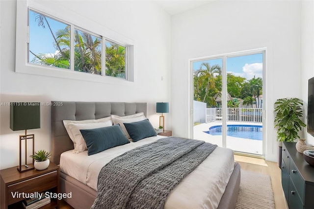 2001 SW 23rd Ave, Fort Lauderdale, FL 33312 - bedroom with access to outside and wood finished floors