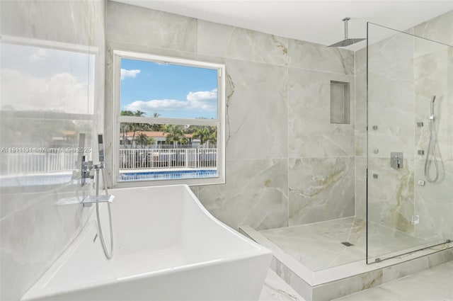 2001 SW 23rd Ave, Fort Lauderdale, FL 33312 - bathroom with a marble finish shower and a freestanding tub