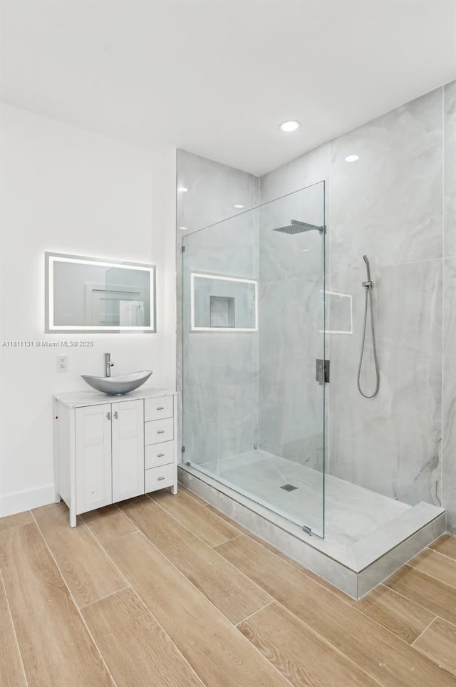 2001 SW 23rd Ave, Fort Lauderdale, FL 33312 - full bathroom with wood tiled floors, walk in shower, vanity, and recessed lighting